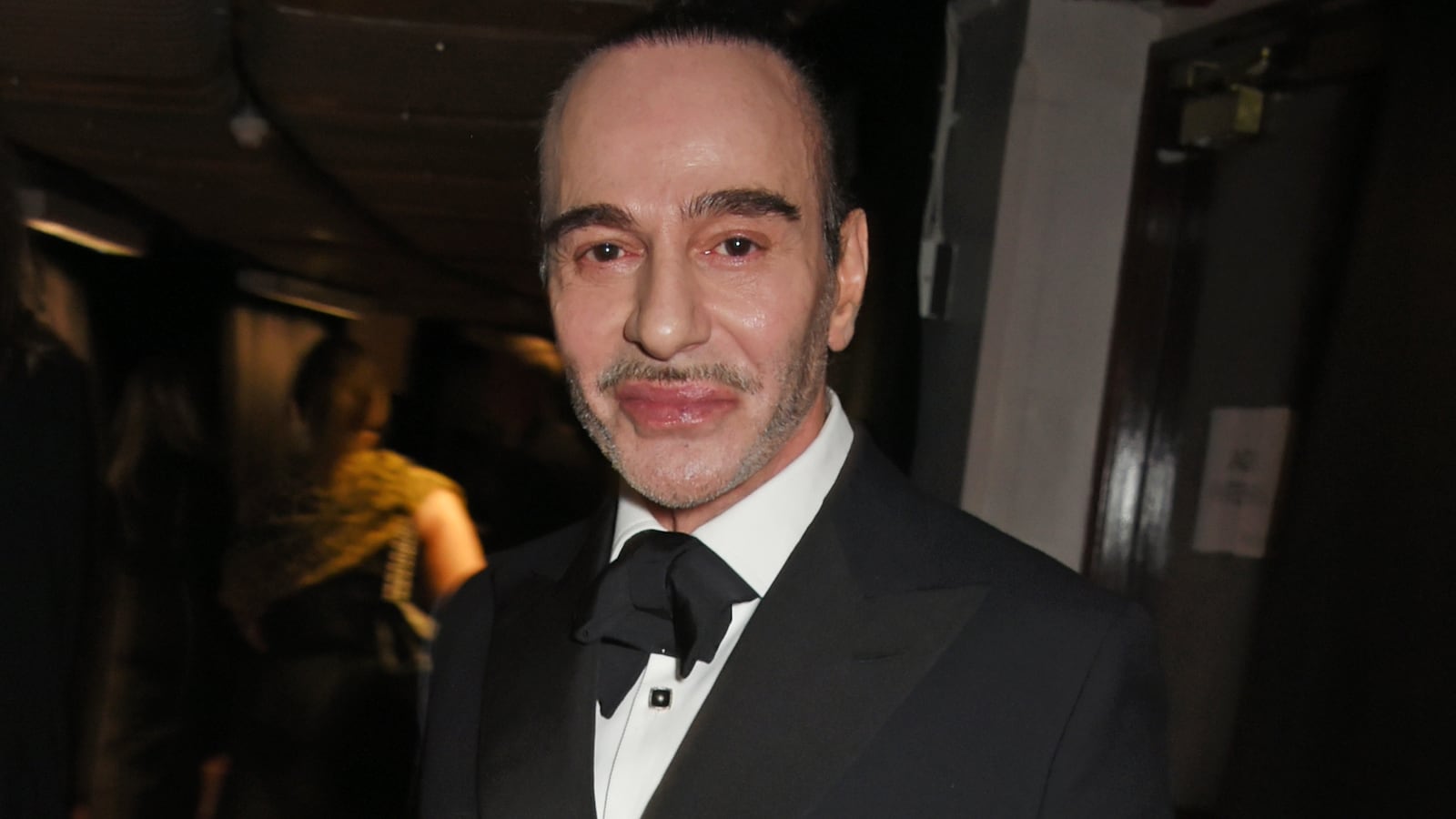 John Galliano poses backstage at The Fashion Awards 2017 in partnership with Swarovski at Royal Albert Hall on December 4, 2017 in London, England.