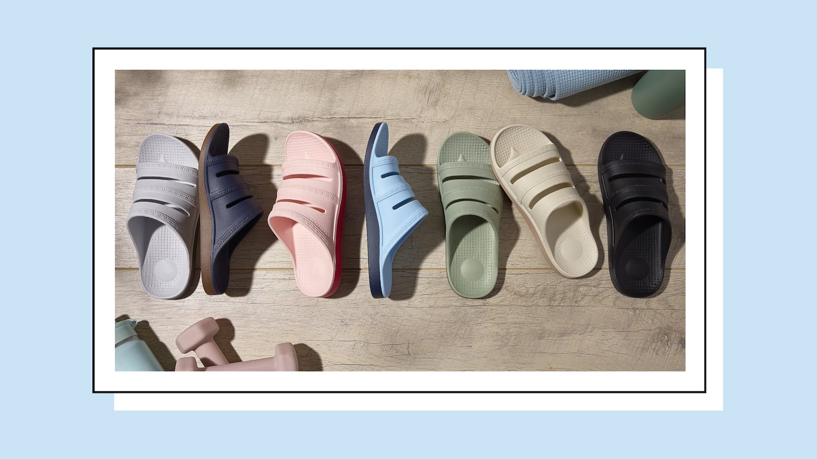 Assorted orthotic recovery slide sandals in neutral and pastel colors, featuring cushioned footbeds, arch support, and lightweight slip-on design for comfort and recovery.