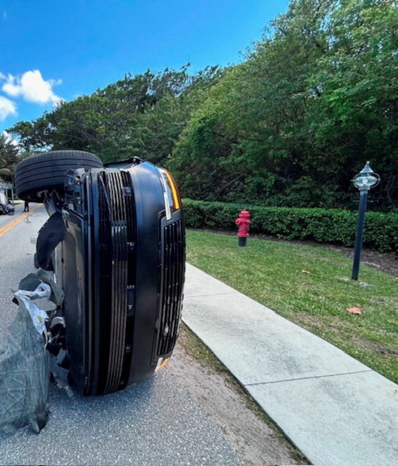 Tiger Woods' Land Rover rolled over on a two-lane road near his Jupiter Island home, in this handout image released by the Martin County Sheriff's Office on March 28, 2026, as Woods was arrested on suspicion of DUI, in Jupiter Island, Florida, U.S.  Martin County Sheriff's Office/Handout via REUTERS THIS IMAGE HAS BEEN SUPPLIED BY A THIRD PARTY. MANDATORY CREDIT NO RESALES. NO ARCHIVES. BEST QUALITY AVAILABLE.