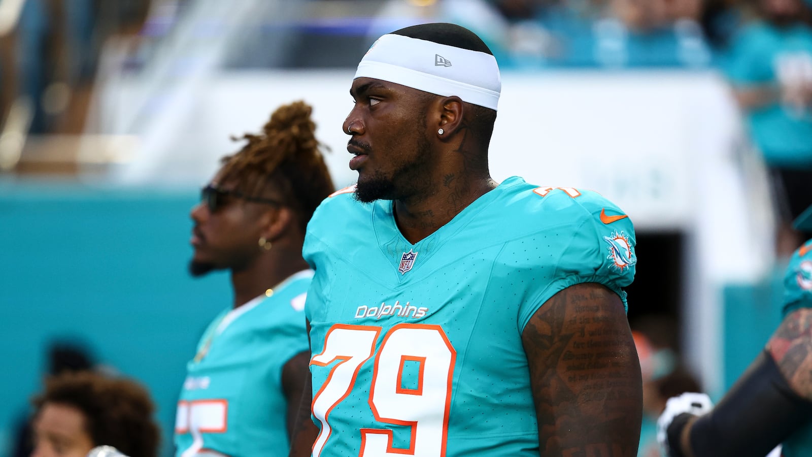 Bayron Matos #79 of the Miami Dolphins stands on the sidelines prior to an NFL preseason football game against the Washington Commanders at Hard Rock Stadium on August 17, 2024 in Miami Gardens, FL.