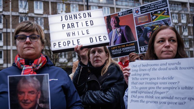 LONDON, ENGLAND - DECEMBER 7: Protests after the arrival of Former British Prime Minister Boris Johnson to the Covid Inquiry on December 7, 2023 in London, England. Britain's former Prime Minister will be questioned during phase 2 of the Covid-19 Inquiry over government decision-making during the pandemic.
