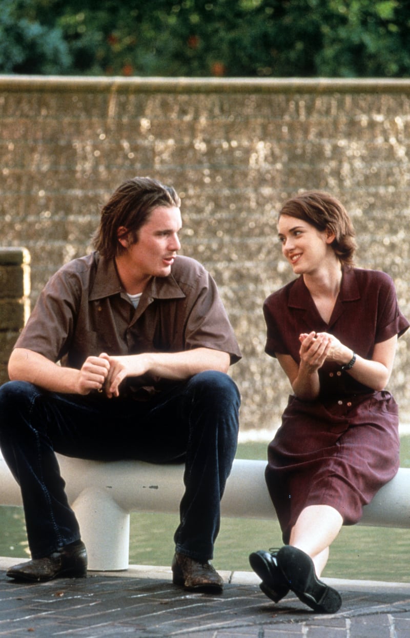 Ethan Hawke sits with Winona Ryder in a scene from the film 'Reality Bites', 1994.