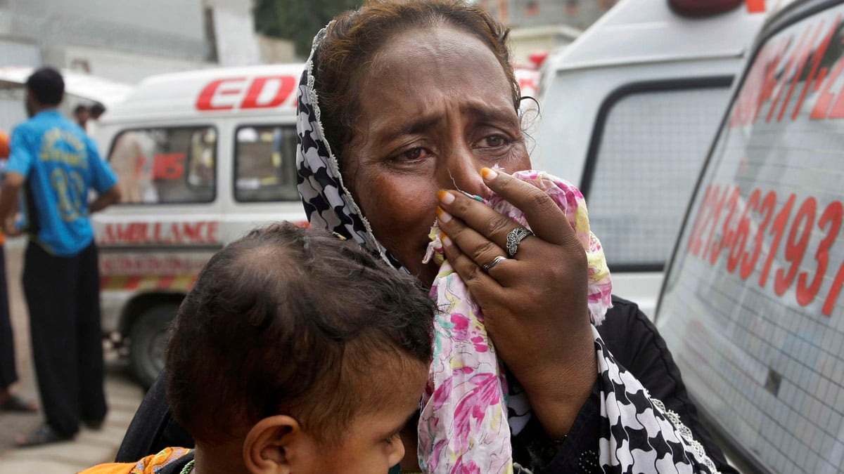 articles/2012/09/12/factory-fire-kills-hundreds-in-pakistan/pakistan-fires-aslam_kczk1f