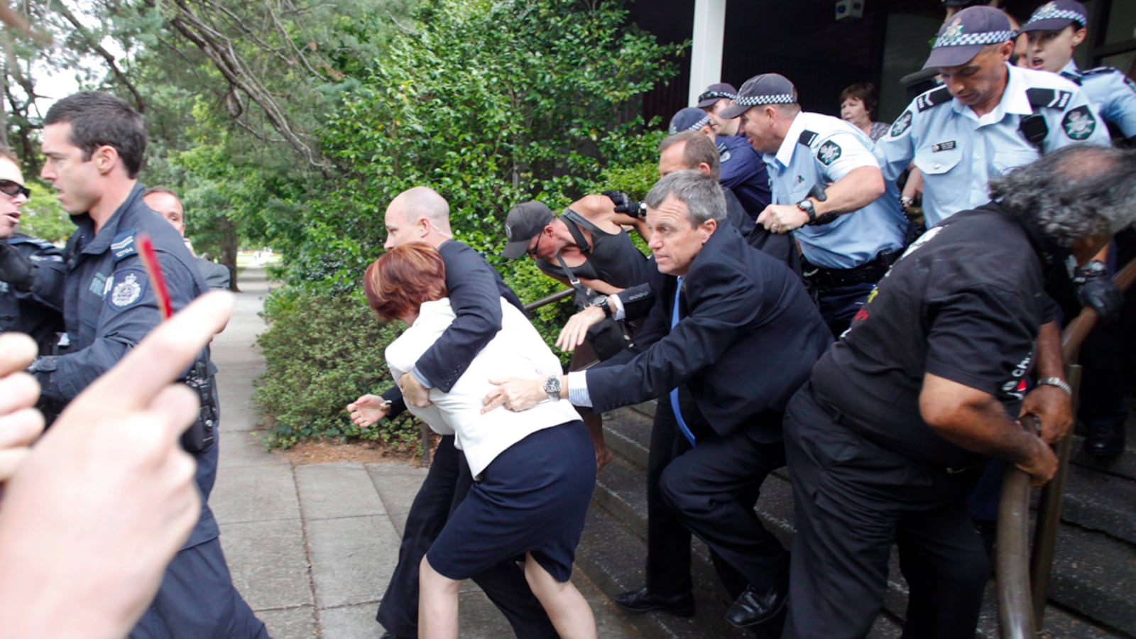 cheats/2012/01/26/australia-p-m-trapped-in-protest/australia-julia-gillard-aboriginal-protest-cheat_cdc9gh