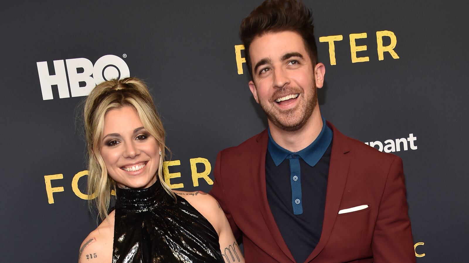 Singer/songwriter Christina Perri and husband Paul Costabile arrive for the HBO documentary premiere of "Foster" at the Linwood Dunn theatre in Los Angeles on April 22, 2019. (Photo by Chris Delmas / AFP) (Photo credit should read CHRIS DELMAS/AFP via Getty Images)