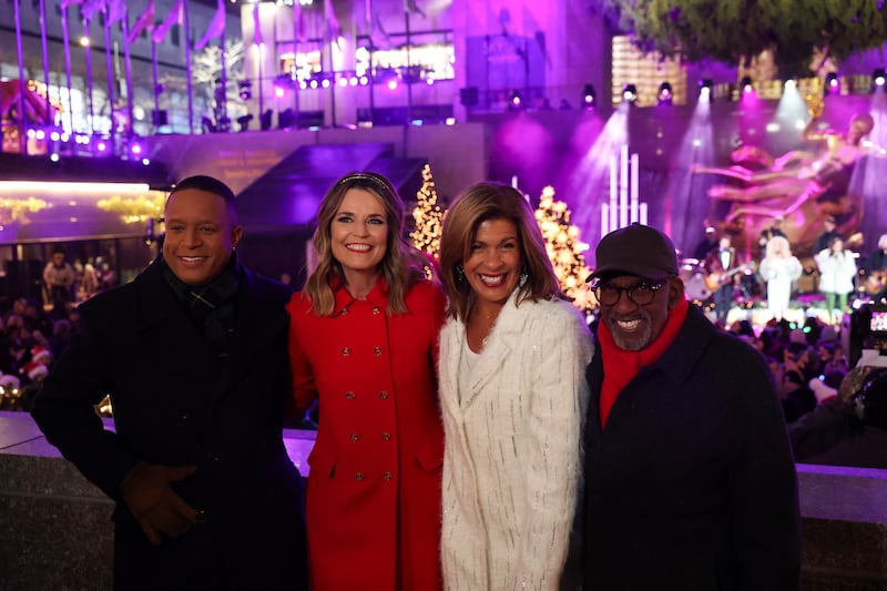 Melvin, Savannah Guthrie, Hoda Kotb, and Roker pose for pictures during the 2024 Rockefeller Center Christmas Tree lighting ceremony in Manhattan. Roker was apparently the intended target of the NBC studios attacker.