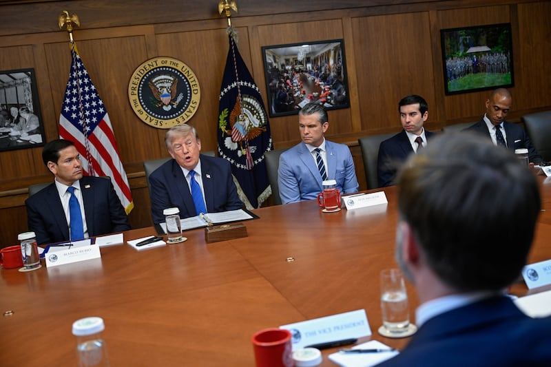 Donald Trump, Vice President JD Vance, Secretary of State Marco Rubio, Secretary of Defense Pete Hegseth, Secretary of Labor Keith Sonderling and Secretary of Housing and Urban Development Scott Turner participate in a cabinet meeting at Camp David in Thurmont, Maryland.