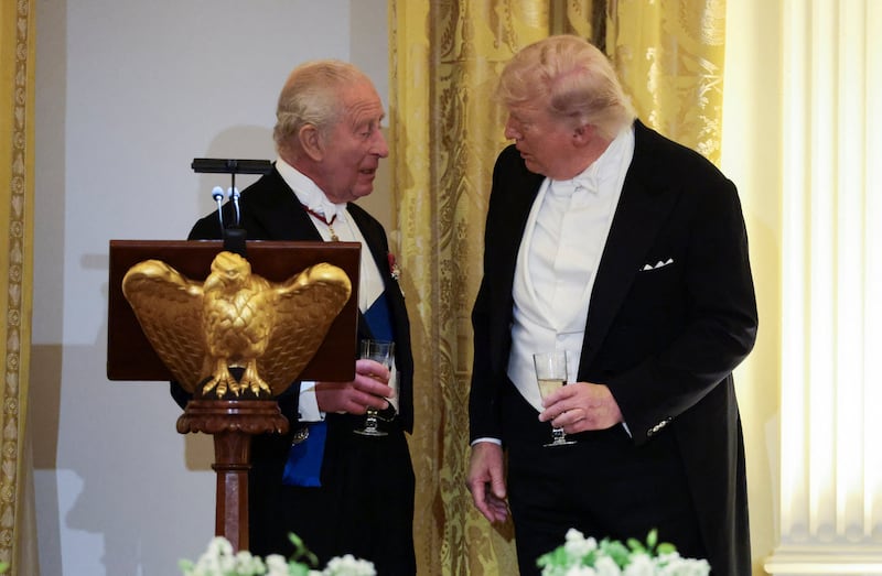 Britain's King Charles and U.S. President Donald Trump talk during a state dinner for Britain's King Charles and Queen Camilla at the White House in Washington, D.C., U.S., April 28, 2026.