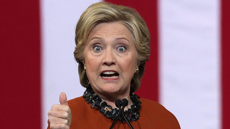 Democratic presidential candidate Hillary Clinton speaks during a campaign event at the Lawrence Joel Veterans Memorial Coliseum October 27, 2016 in Winston-Salem, North Carolina. U.S. first lady Michelle Obama joined Clinton for the first time to campaign for the presidential election.