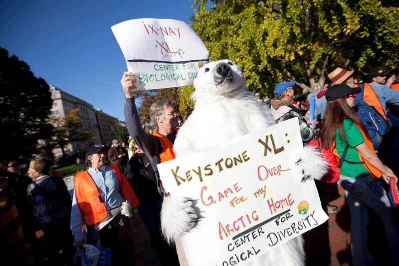 articles/2011/11/07/keystone-oil-pipeline-poses-no-win-situation-for-obama/keystone-protests-stone_kz6fxo