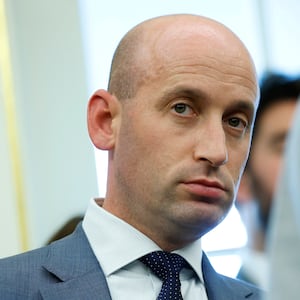 WASHINGTON, DC - OCTOBER 15: White House Deputy Chief of Staff Stephen Miller looks on during a press conference in the Oval Office of the White House on October 15, 2025 in Washington, DC. Federal Bureau of Investigation Director Kash Patel provided an update on the Trump administration’s progress in reducing violent crime. (Photo by Kevin Dietsch/Getty Images)