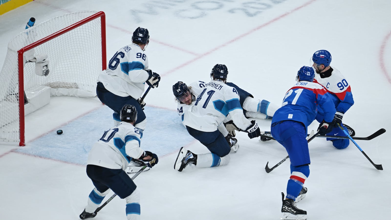 Slovakia's Adam Ruzicka 2nd R scores during the ice hockey men's preliminary round group B match between Finland and Slovakia at the Milan-Cortina 2026 Olympic Winter Games in Milan, Italy, Feb. 11, 2026.