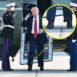 Donald Trump cankles as he steps off Marine One at Geneva Airport after attending the G7 summit, in Geneva on June 17, 2026.