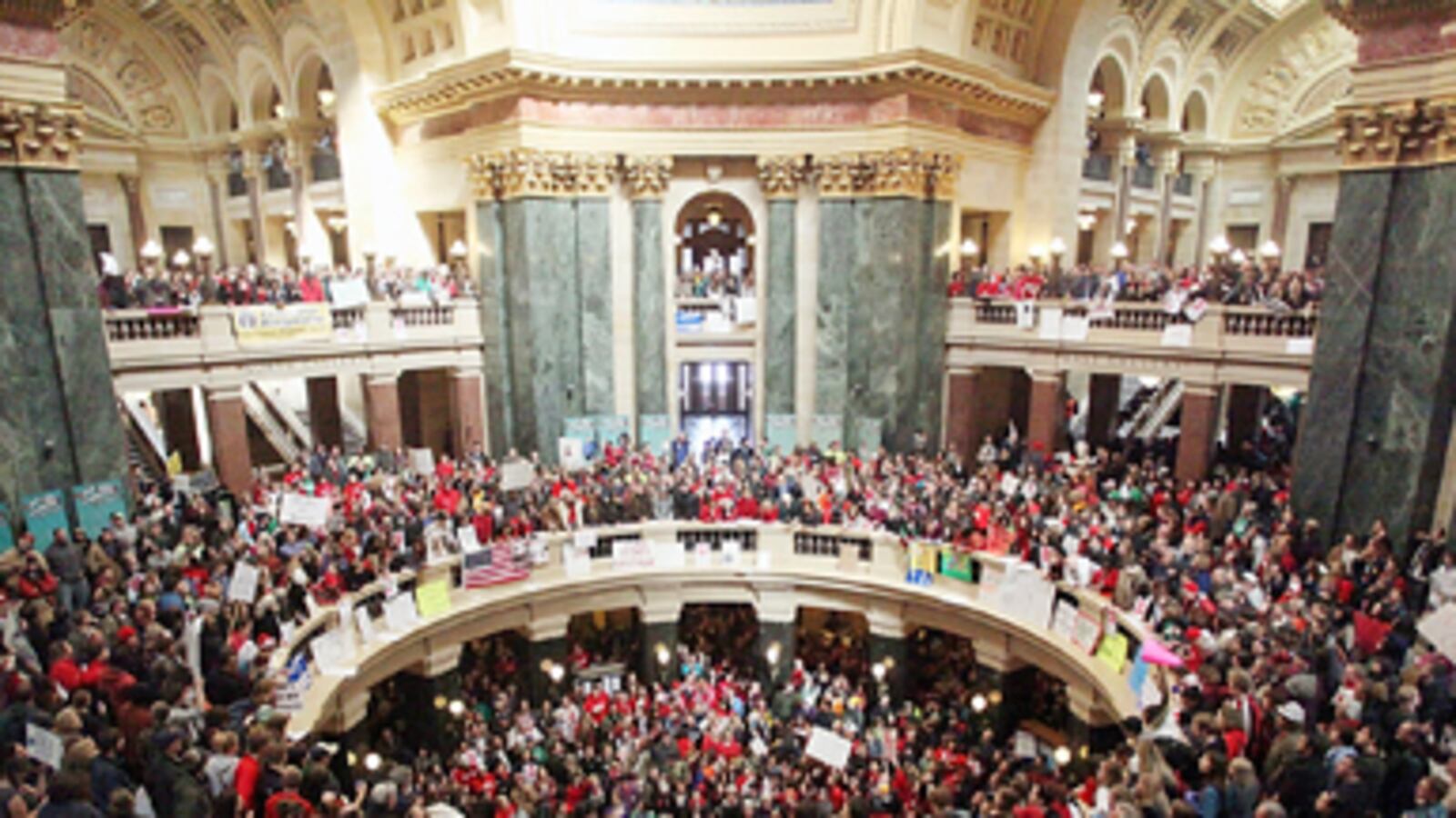 cheats/2011/05/26/wi-judge-strikes-down-union-law/wisconsin-budget-protest_yf5htz