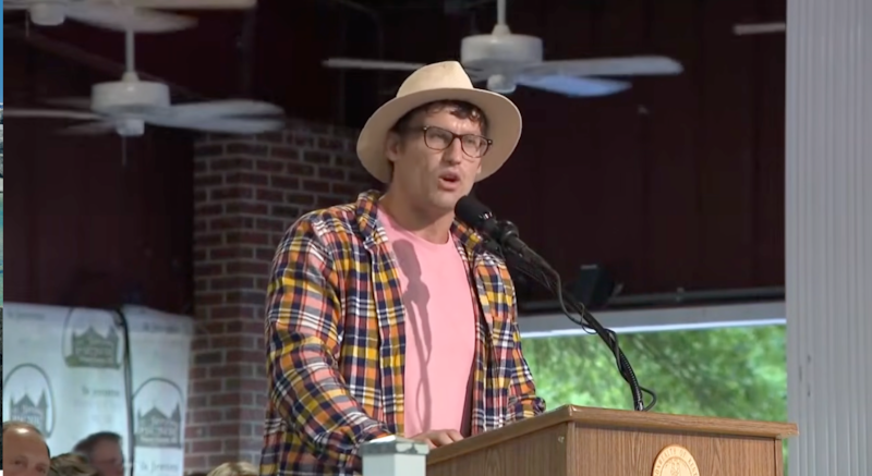Christopher Campbell at the podium.