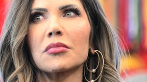 US Secretary of Homeland Security Kristi Noem looks on during a meeting with the White House Task Force on the FIFA World Cup 2026 in the Oval Office