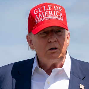 President Donald Trump and Department of Homeland Security Secretary Kristi Noem