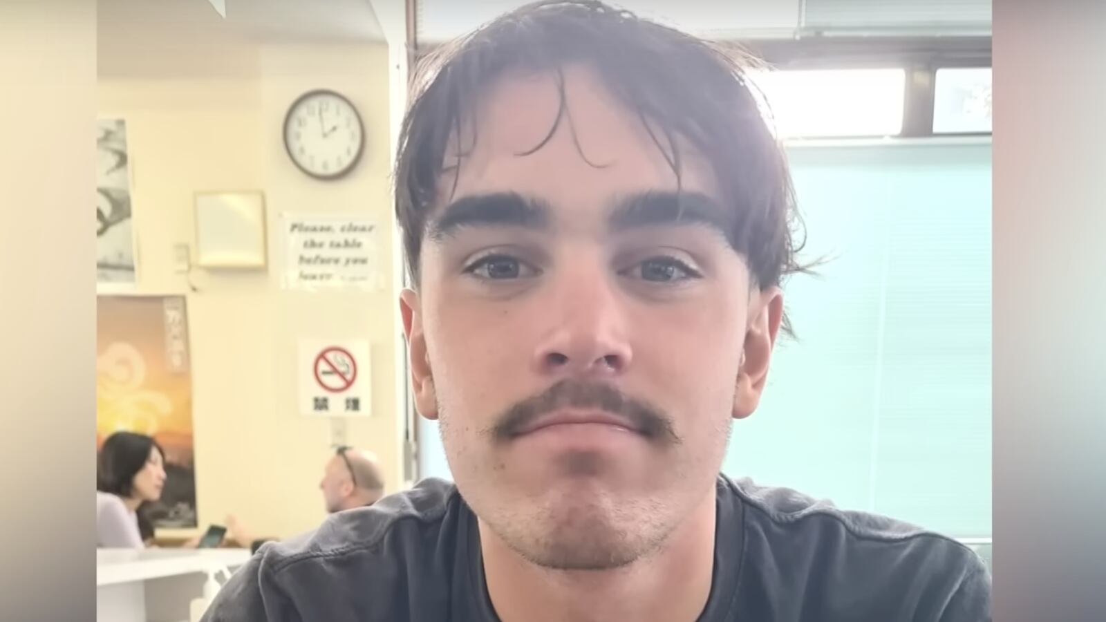 Darcy Deefholts, a surfer, was rescued after spending the night on an uninhabited island.