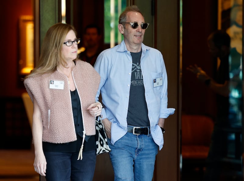 Amazon.com President and CEO Andy Jassy and his wife Elana Jassy wore muted colors and casual fits as they strolled away from the Sun Valley Lodge.