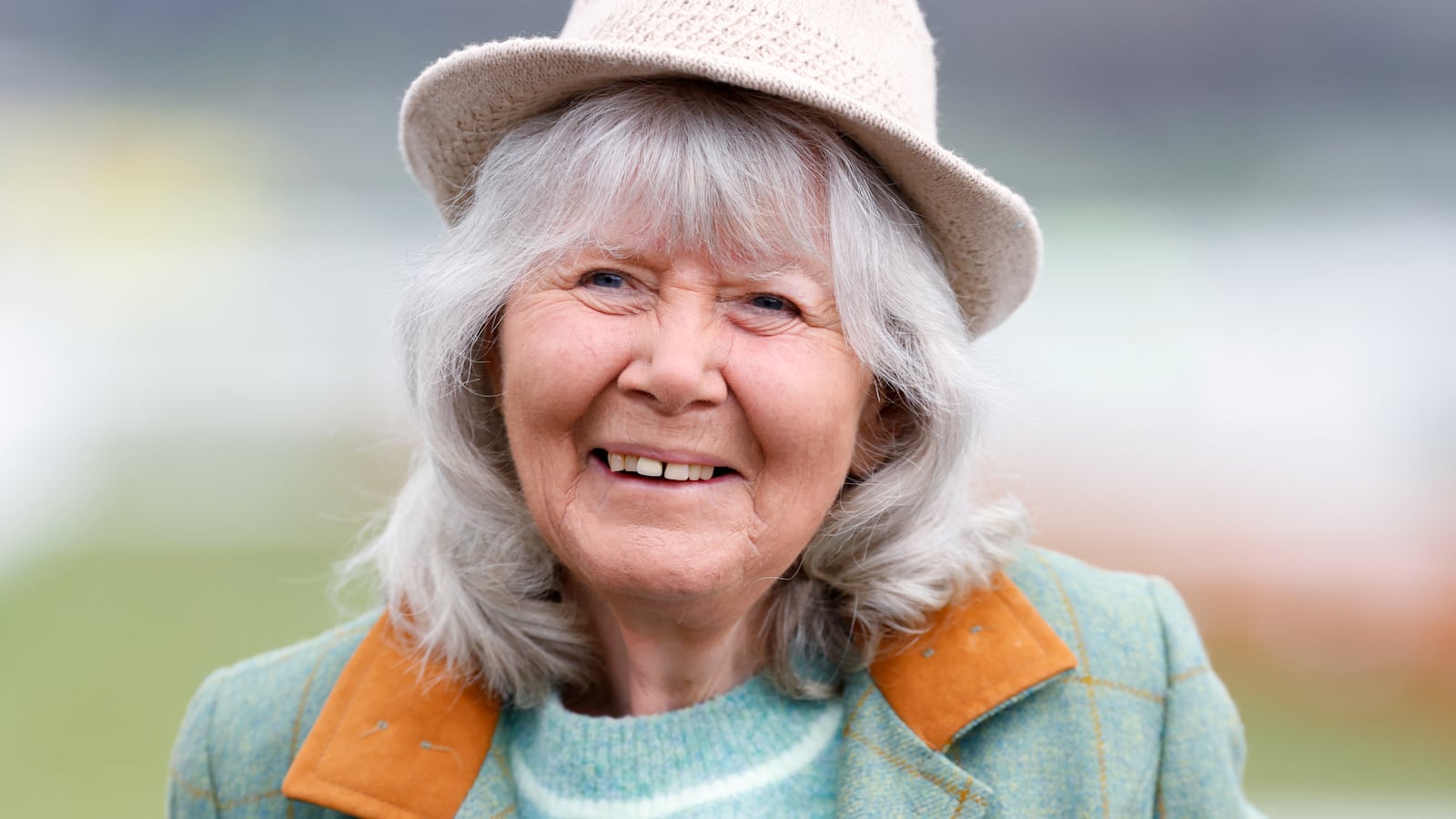 Dame Jilly Cooper attends day 2 'Style Wednesday' of the Cheltenham Festival at Cheltenham Racecourse