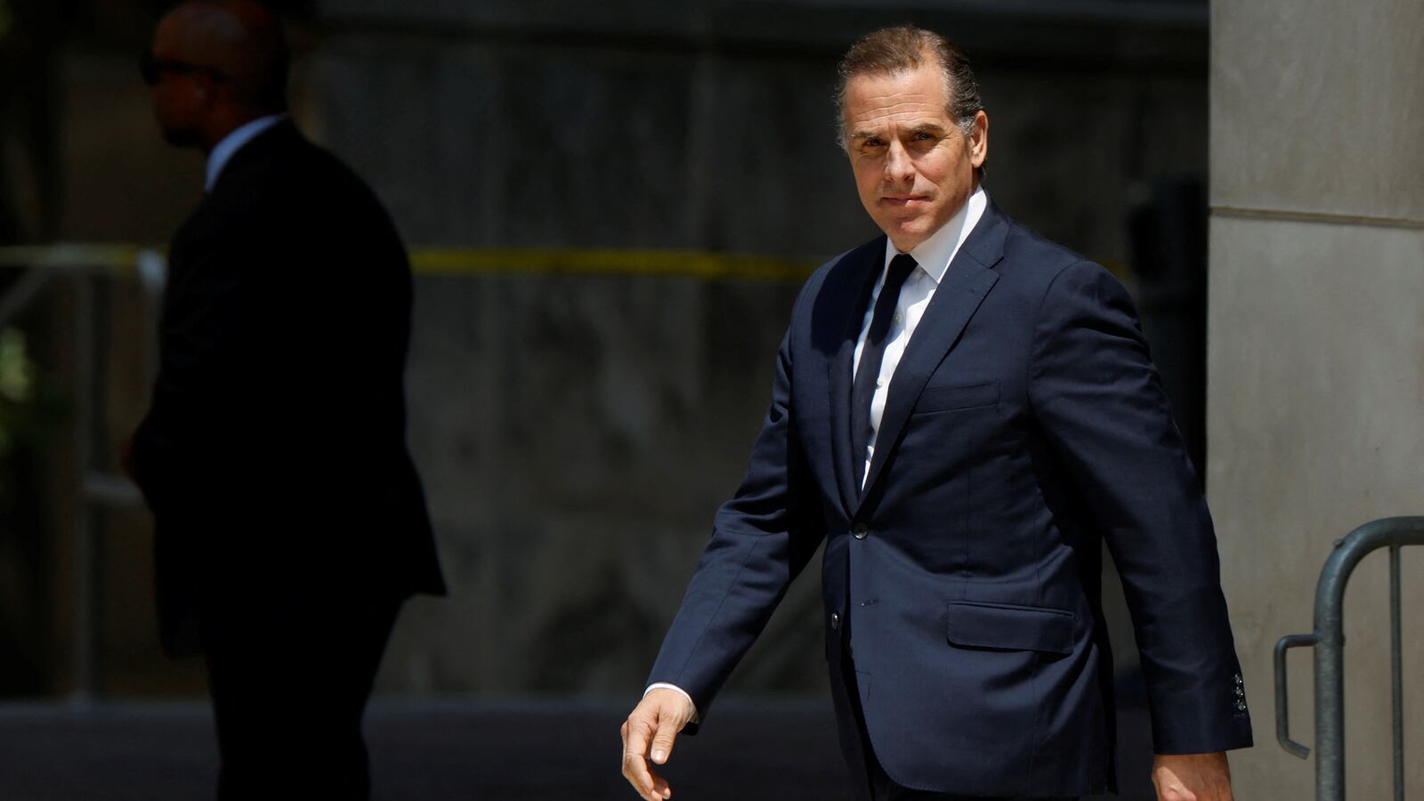 Hunter Biden, son of U.S. President Joe Biden, departs federal court after a plea hearing on two misdemeanor charges of willfully failing to pay income taxes in Wilmington, Delaware.