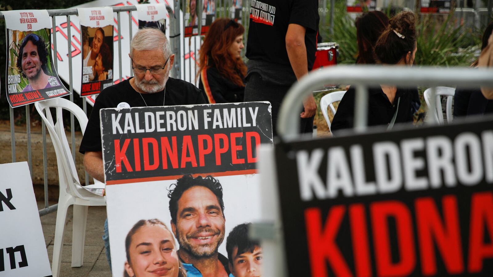 A person looks on as the families and supporters of hostages held in Gaza by Hamas gather to raise awareness and demand their immediate release in Tel Aviv, Israel November 22, 2023.