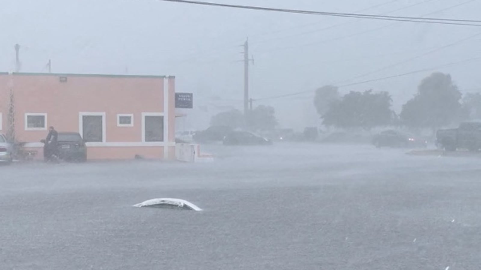 A general view shows a flooded street in Fort Lauderdale, Florida, April 12, 2023, in this screen grab obtained from social media.