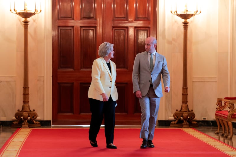White House Chief of Staff Susie Wiles (L) and White House Deputy Chief of Staff Stephen Miller