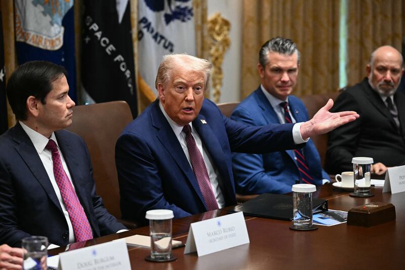US President Donald Trump speaks during in a cabinet meeting, alongside Secretary of State Marco Rubio (L), Secretary of Defense Pete Hegseth (2R), and Secretary of Commerce Howard Lutnick (R), in the Cabinet Room of the White House in Washington, DC on August 26, 2025. (Photo by Mandel NGAN / AFP) (Photo by MANDEL NGAN/AFP via Getty Images)