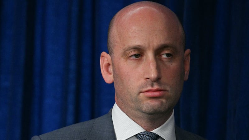 White House Deputy Chief of Staff Stephen Miller looks on as President Donald Trump speaks to the press following US military actions in Venezuela, at his Mar-a-Lago residence in Palm Beach, Florida, on January 3, 2026.