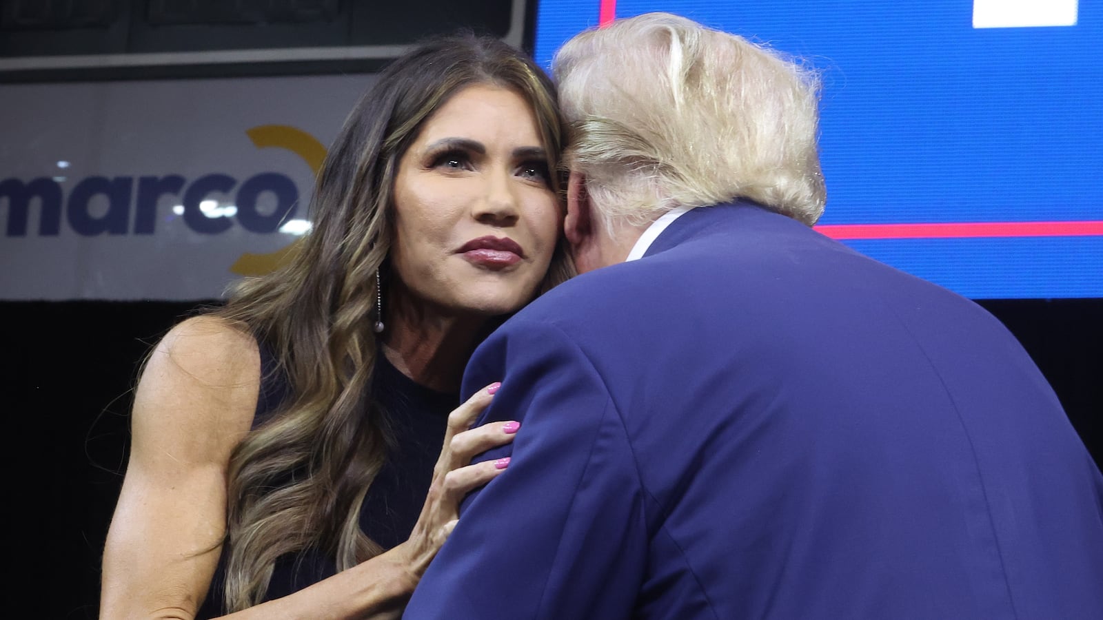 RAPID CITY, SOUTH DAKOTA - SEPTEMBER 08: Republican presidential candidate former President Donald Trump greets South Dakota Governor Kristi Noem after she introduced him at the Monument Leaders Rally hosted by the South Dakota Republican Party on September 08, 2023 in Rapid City, South Dakota. Noem endorsed Trump during the event.