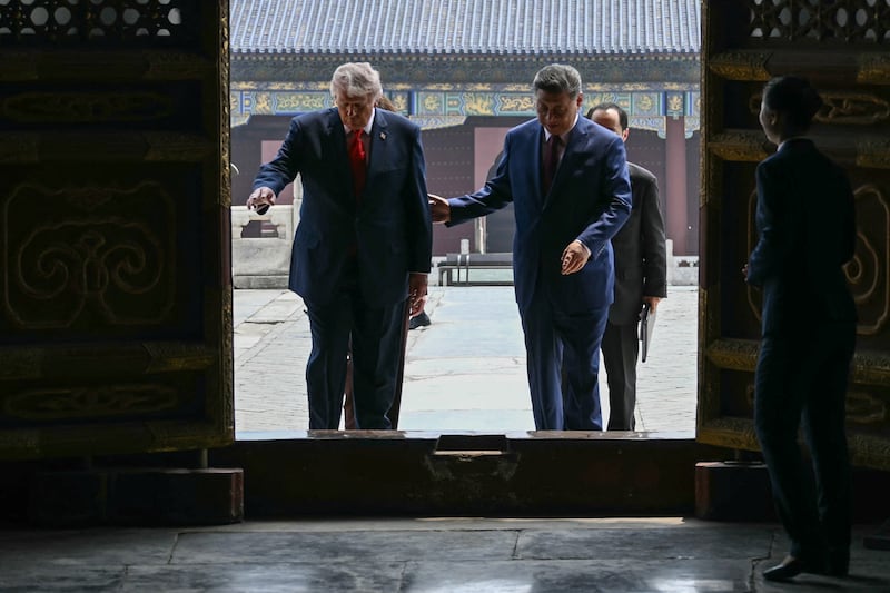 China's President Xi Jinping and US President Donald Trump visit the Temple of Heaven in Beijing on May 14, 2026.