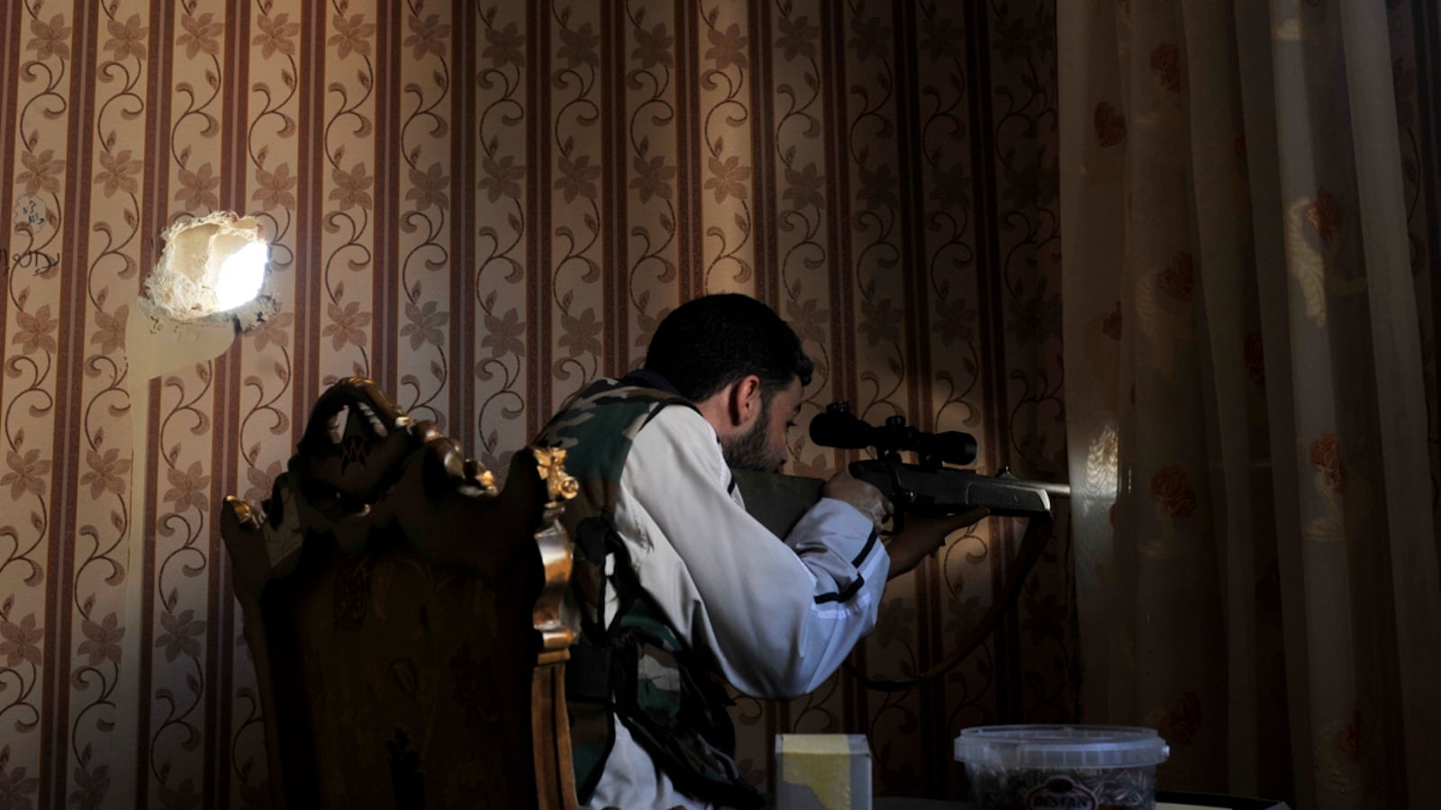 articles/2012/10/19/on-syria-s-frontlines-sniper-hunts-sniper/muse-syria-snipers-tease_jhjlgs