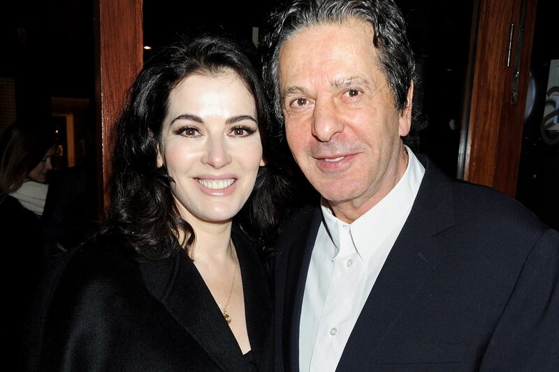 articles/2013/06/17/nigella-lawson-leaves-home-after-press-reports-that-charles-saatchi-choked-her/130616-sykes-lawson-tease_qpole3