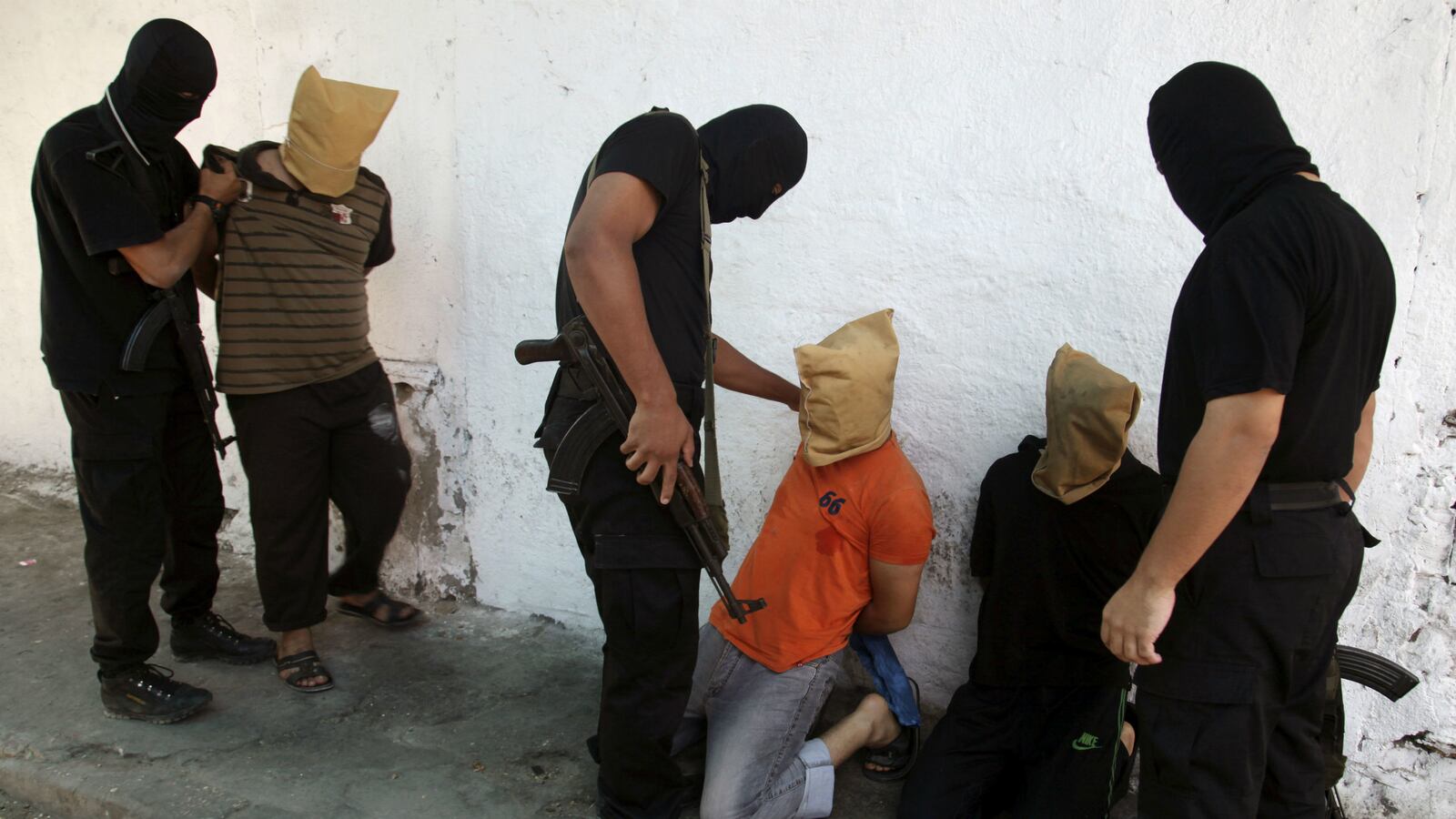 cheats/2015/05/27/hamas-masked-killings-with-gaza-conflict/150526-hamas-executions-cheat_il5n0m