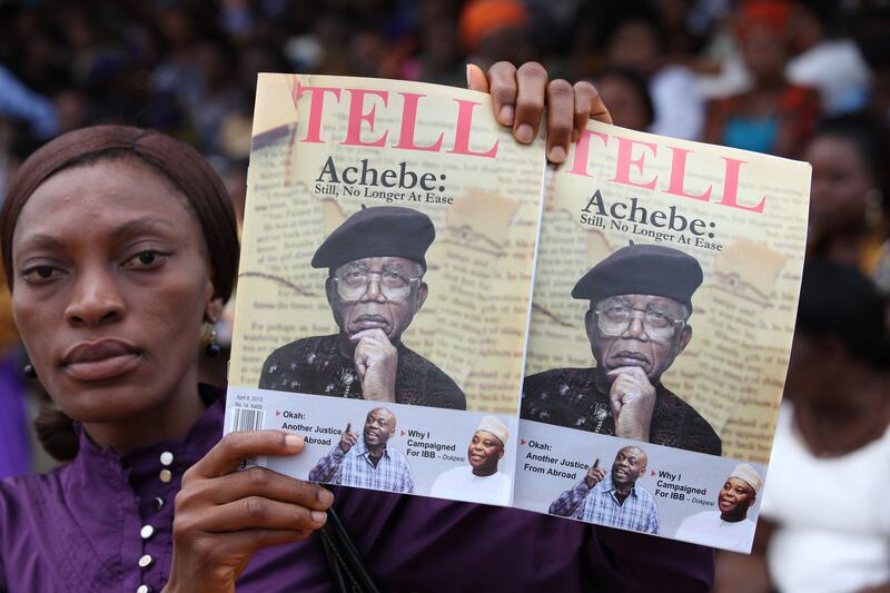 galleries/2013/05/23/laying-to-rest-literary-giant-chinua-achebe/130523-achebe-tell_jbsfi9