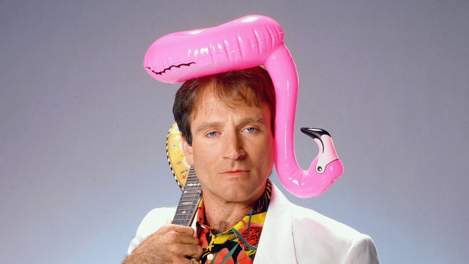 articles/2014/08/12/many-faces-and-one-of-a-kind-the-making-of-robin-williams/140811-shales-rw-standup-tease_cirj4c