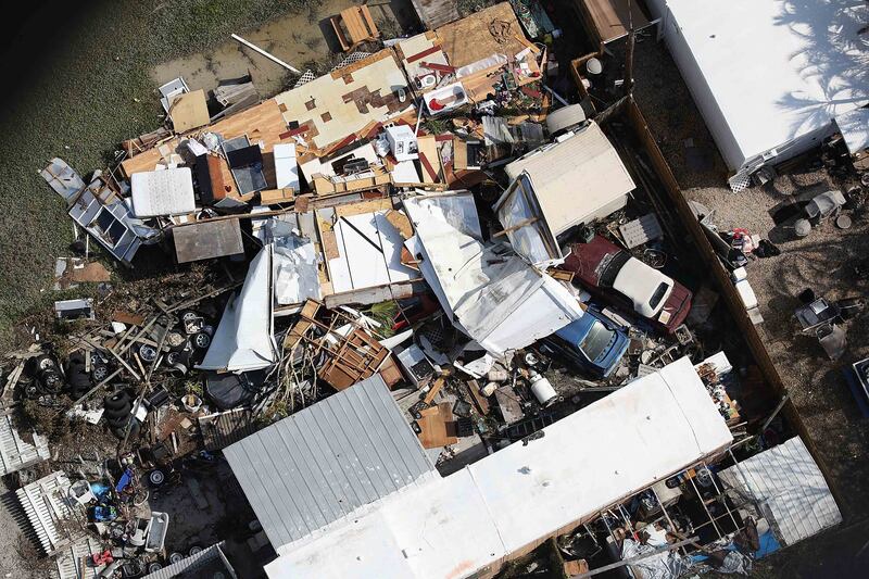 Damaged homes and streets littered with debris are seen after Hurricane Irma
