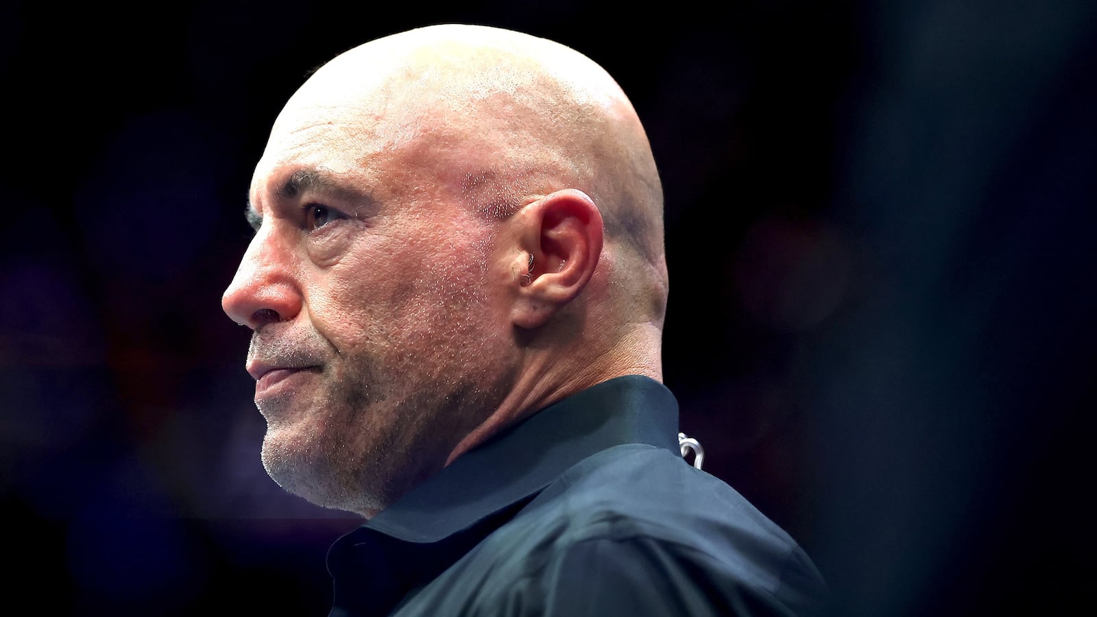 NEWARK, NEW JERSEY - JUNE 07: Joe Rogan looks on during UFC 316 at the Prudential Center on June 07, 2025 in Newark, New Jersey. (Photo by Elsa/Getty Images)