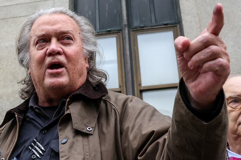 FILE PHOTO: Steve Bannon, former advisor of U.S. President Donald Trump, speaks to the press, after pleading guilty, on the day of a pre-trial conference hearing in his fraud case stemming from a fundraising effort to build a border wall, at the New York Criminal Court, in New York City, U.S., February 11, 2025. REUTERS/Brendan McDermid/File Photo