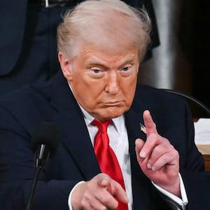 President Donald Trump gestures as he delivers the State of the Union address.