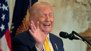 President Donald Trump talks about Nicki Minaj's "beautiful" skin and long nails at a Black History Month reception in the East Room of the White House on February 18, 2026.