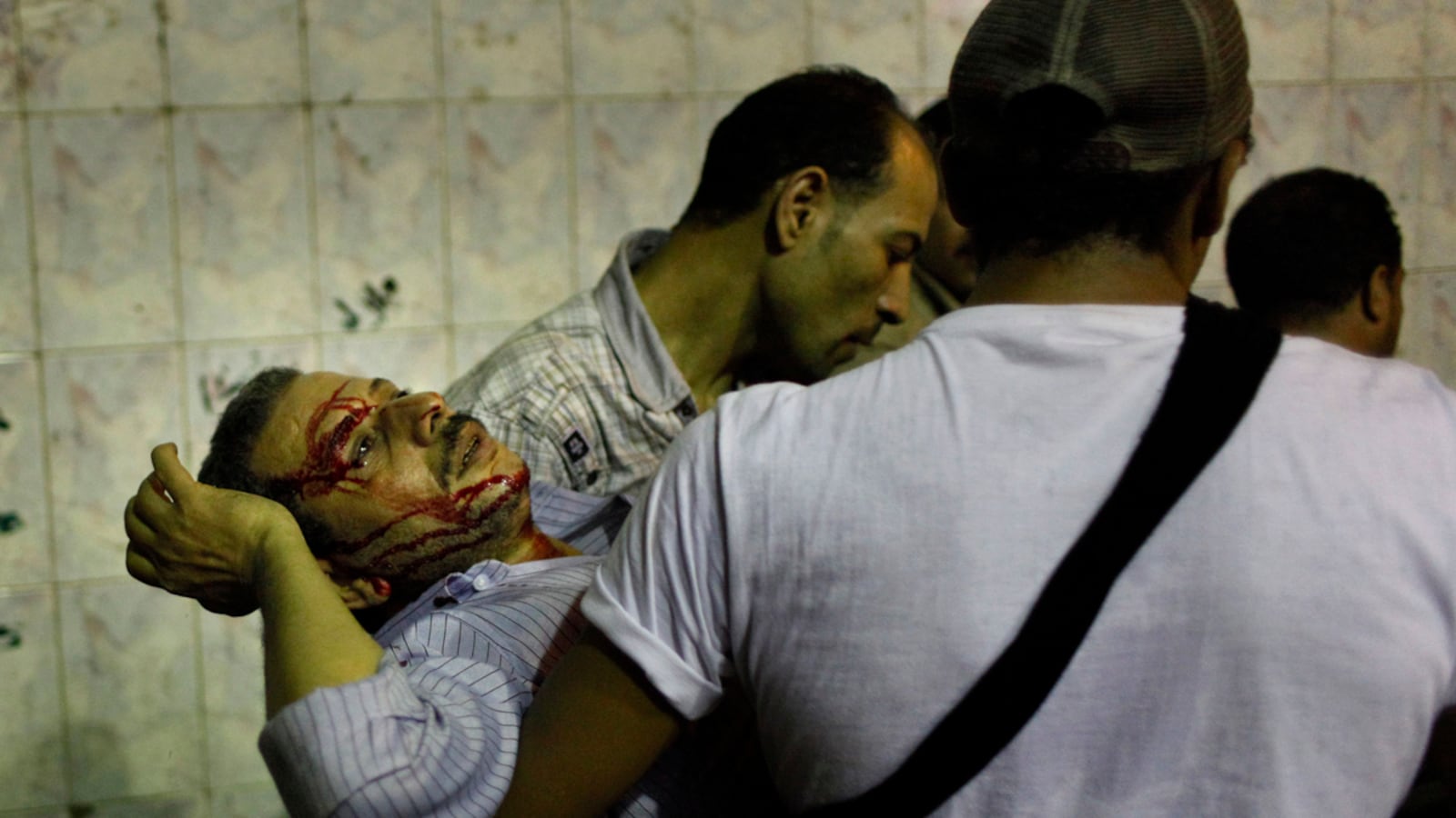 articles/2011/10/10/egypt-erupts-in-violence-as-army-kills-copts-in-muslim-christian-clashes/egypt-coptic-protests-linsey_krq3mf