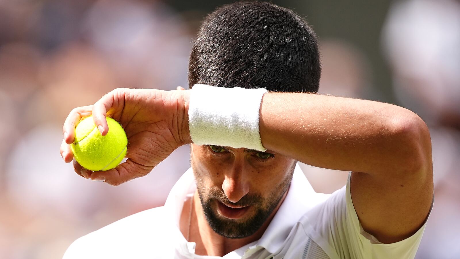 Novak Djokovic reacts against Carlos Alcaraz (not pictured) in the Gentlemen's Singles Final on day fourteen of the 2024 Wimbledon Championships at the All England Lawn Tennis and Croquet Club, London. Picture date: Sunday July 14, 2024. (Photo by Aaron Chown/PA Images via Getty Images)