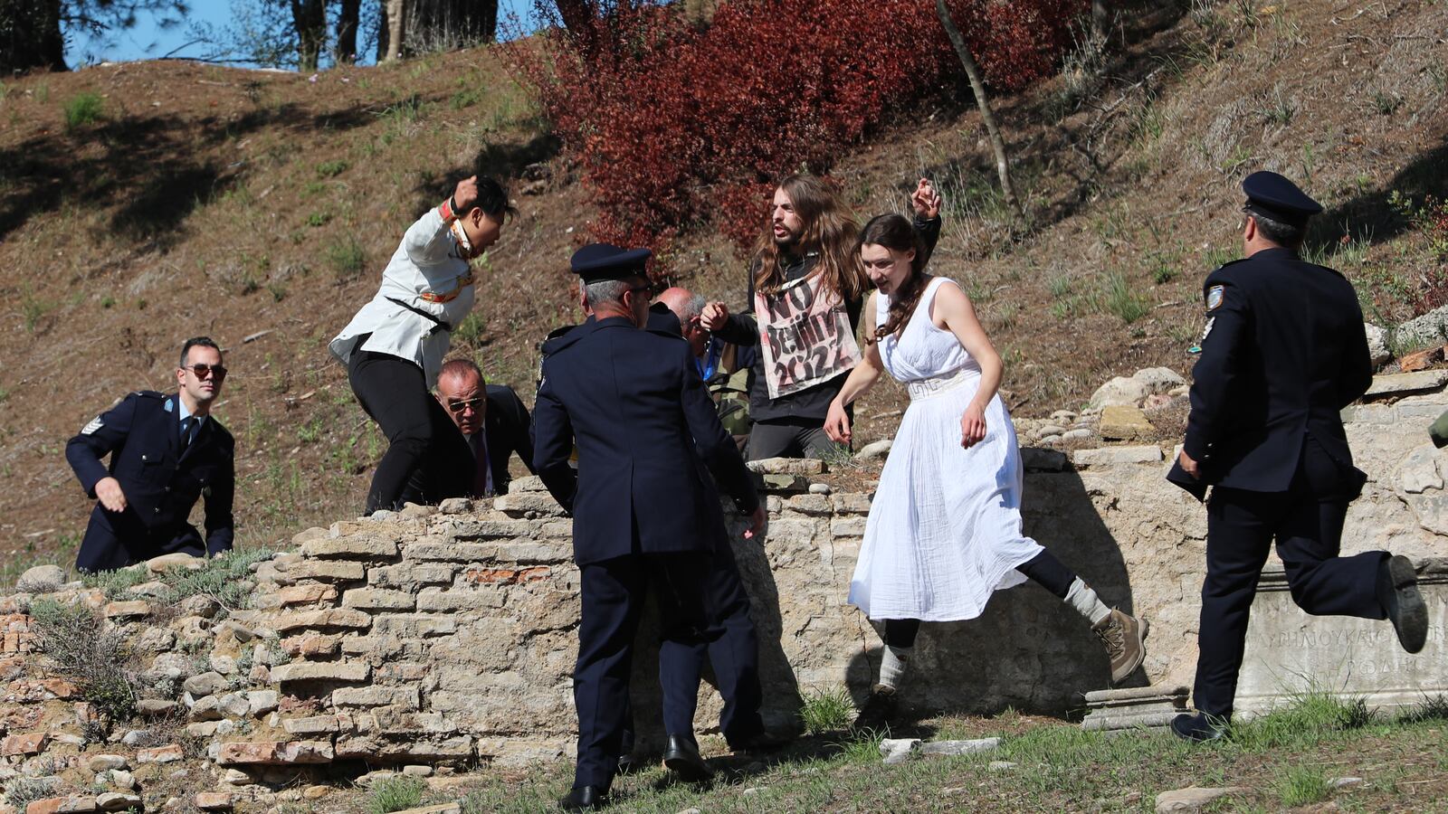 2021-10-18T102519Z_1051424227_UP1EHAI0SY42M_RTRMADP_3_OLYMPICS-2022-FLAME_aghacn