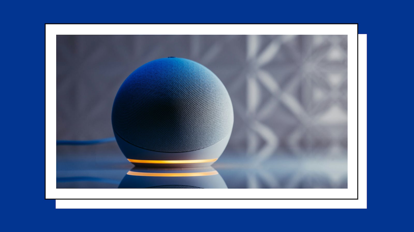 An Amazon Echo Dot on a table.