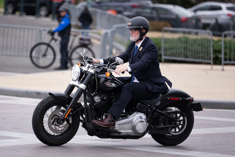 UNITED STATES - DECEMBER 18: Rep. Derrick Van Orden, R-Wis., rides his motorcycle to the U.S. Capitol on Wednesday, December 18, 2024. (Tom Williams/CQ-Roll Call, Inc via Getty Images)