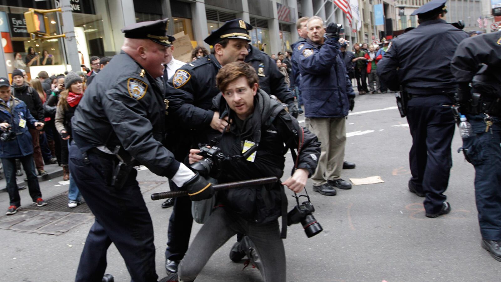 cheats/2012/01/25/finland-tops-press-freedom-list/photographer-occupy-wall-street-cheat_tkwzug