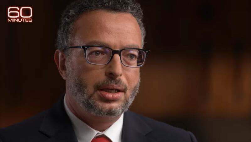 A screenshot of Erez Reuveni speaking to 60 Minutes.