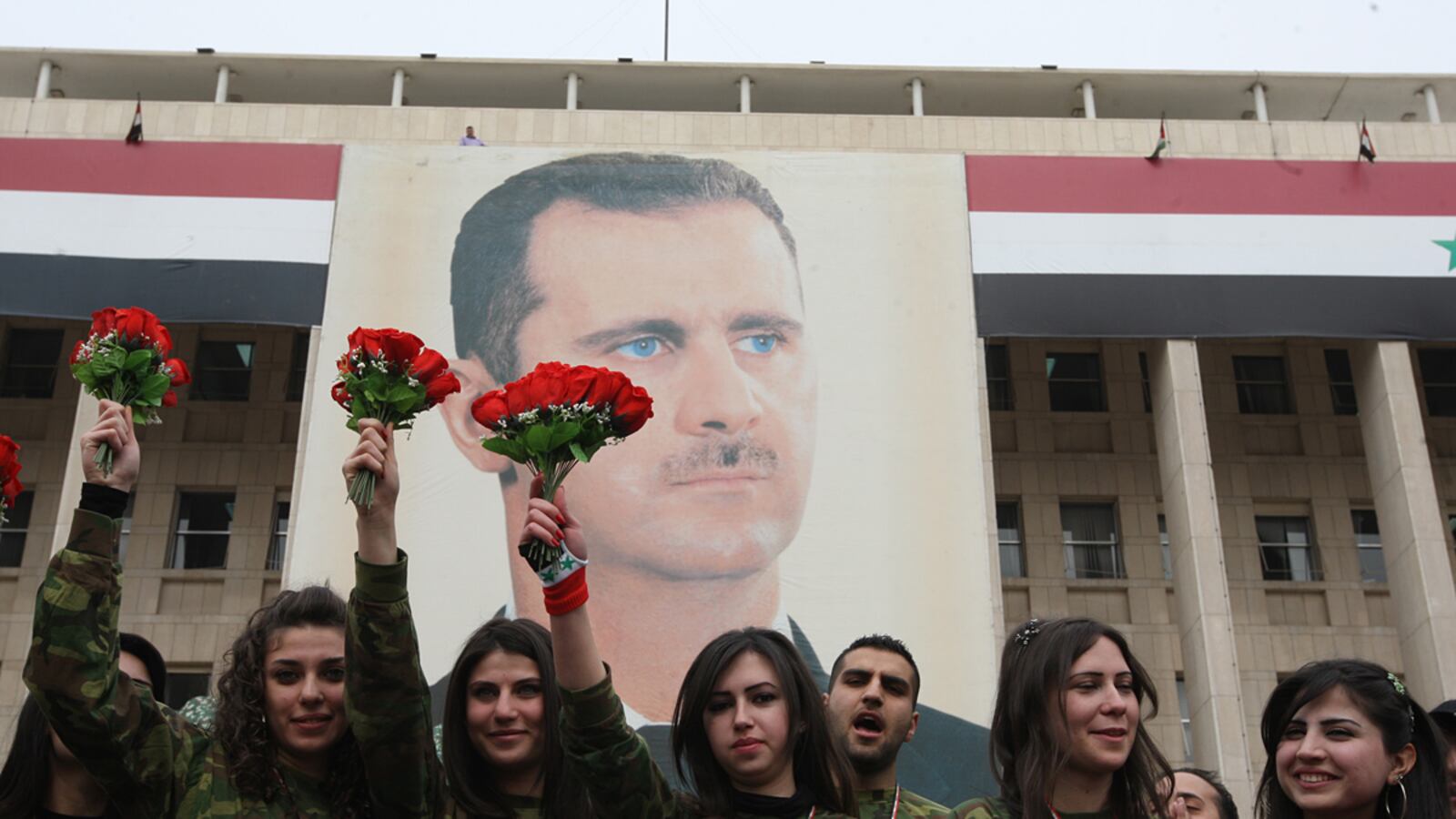 articles/2012/02/15/what-assad-wants-in-syria-unsanctioned-international-military-action/syria-assad-valentines-day-shaikh_vxw51s